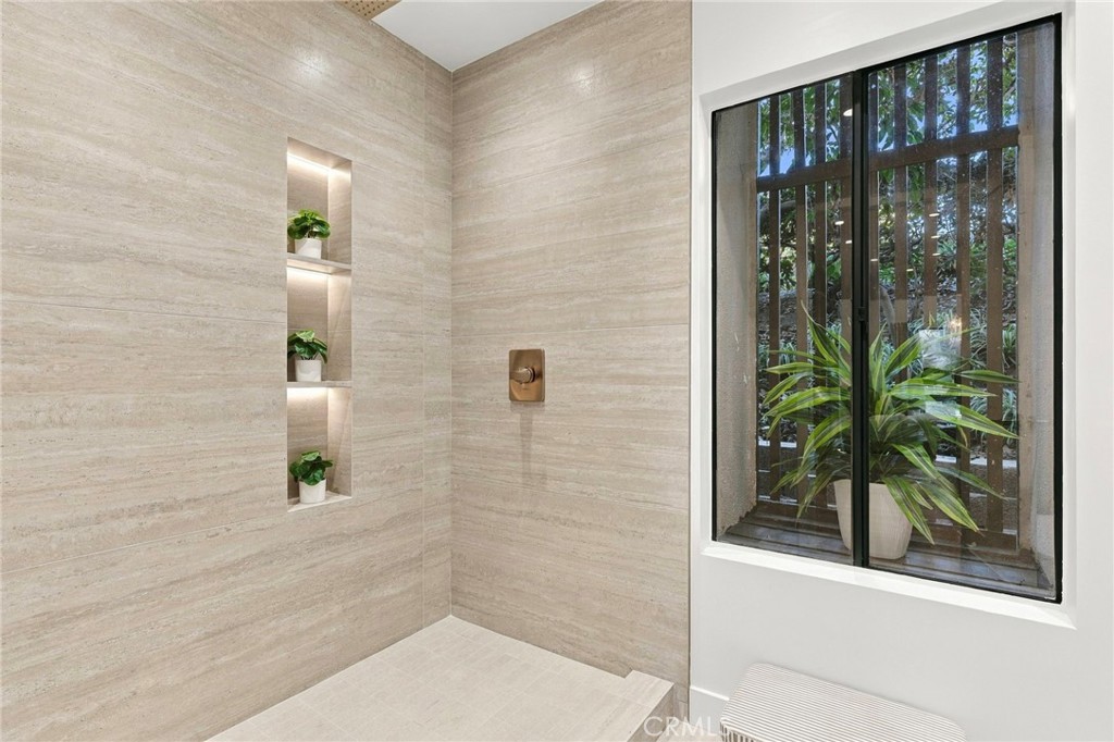 Primary bathroom with a beautiful window accent - 11 Palos 55, Irvine CA 92612 - photo 20