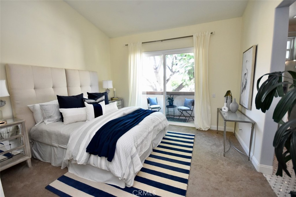 Spacious master suite with 2nd private balcony and tranquil tree view. - 1103 Solvay Aisle, Irvine CA 92606 - photo 13