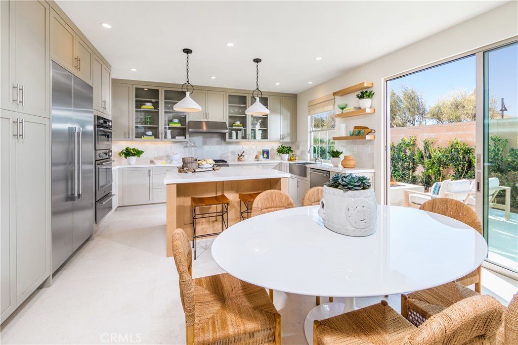 Model Home - Kitchen and eating area - 115 Anthem, Irvine CA 92618 - photo 3