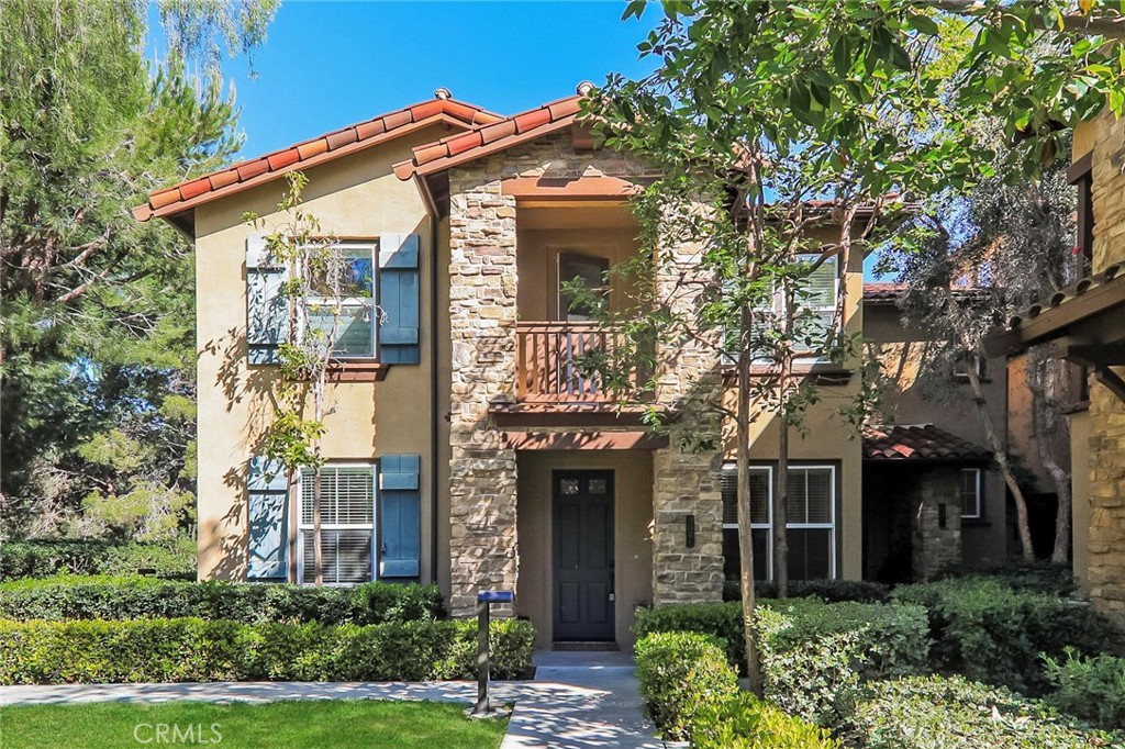 Front courtyard and exterior - 115 Danbrook, Irvine CA 92603 - photo 1