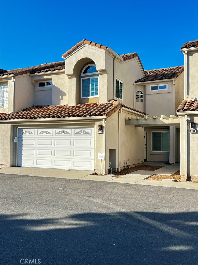 front of residence (currently hoa is redoing landscape) - 116 Almador, Irvine CA 92614 - photo 1