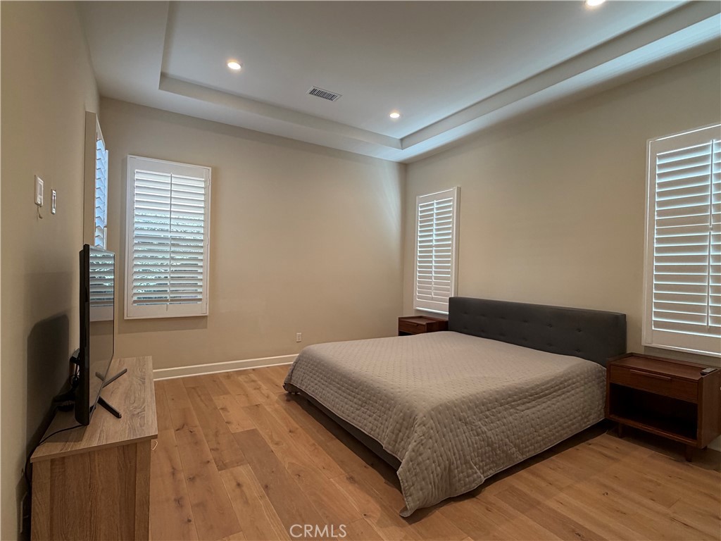 Downstairs primary bedroom - 116 Rotunda, Irvine CA 92620 - photo 10