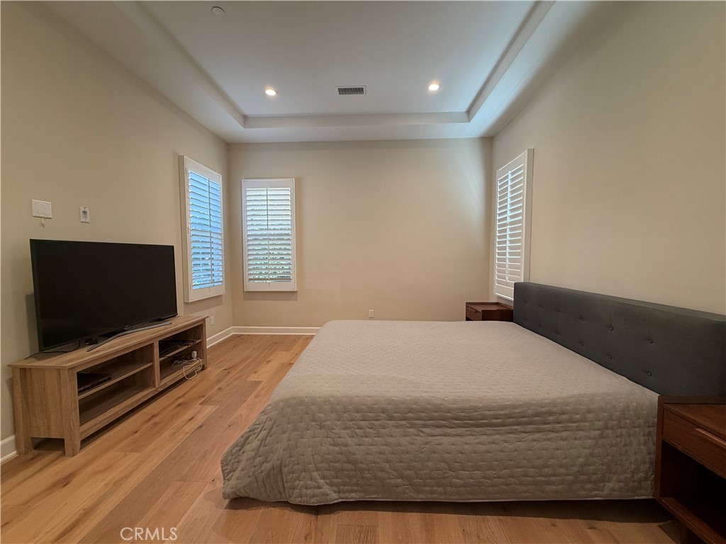 Downstairs primary bedroom - 116 Rotunda, Irvine CA 92620 - photo 11