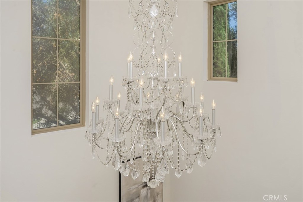 As you go upstairs, you can see the gorgeous chandelier. - 117 Gemstone, Irvine CA 92620 - photo 3