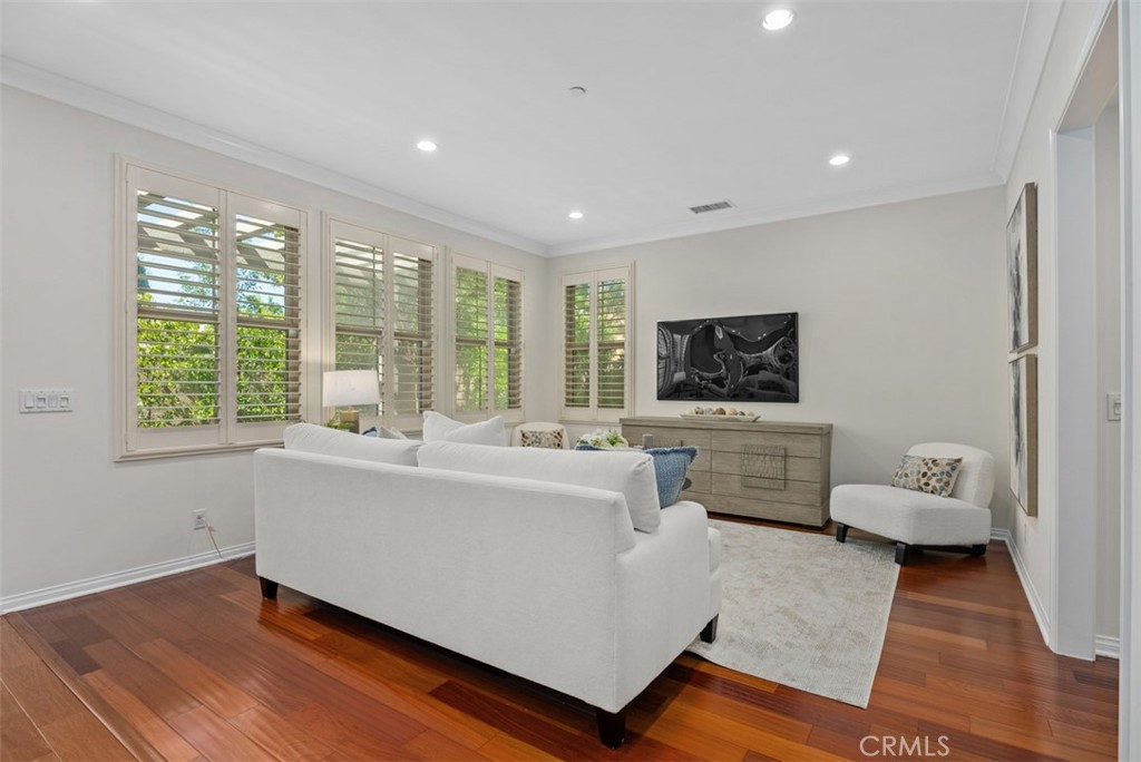 Living room overlooks the patio area. - 117 Gemstone, Irvine CA 92620 - photo 7