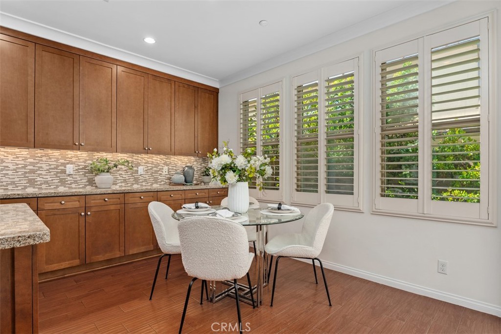 View of dining room that overlooks the backyard. - 117 Gemstone, Irvine CA 92620 - photo 11