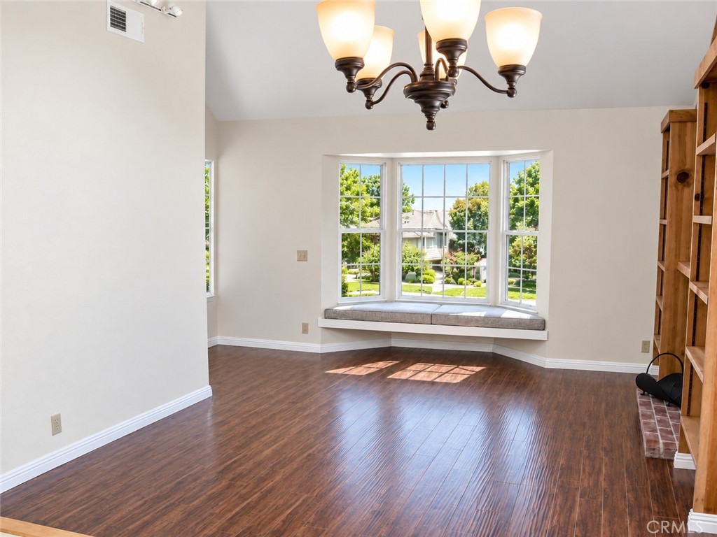 Built in bookshelving flanks the fireplace - 12 Spring Buck, Irvine CA 92614 - photo 2