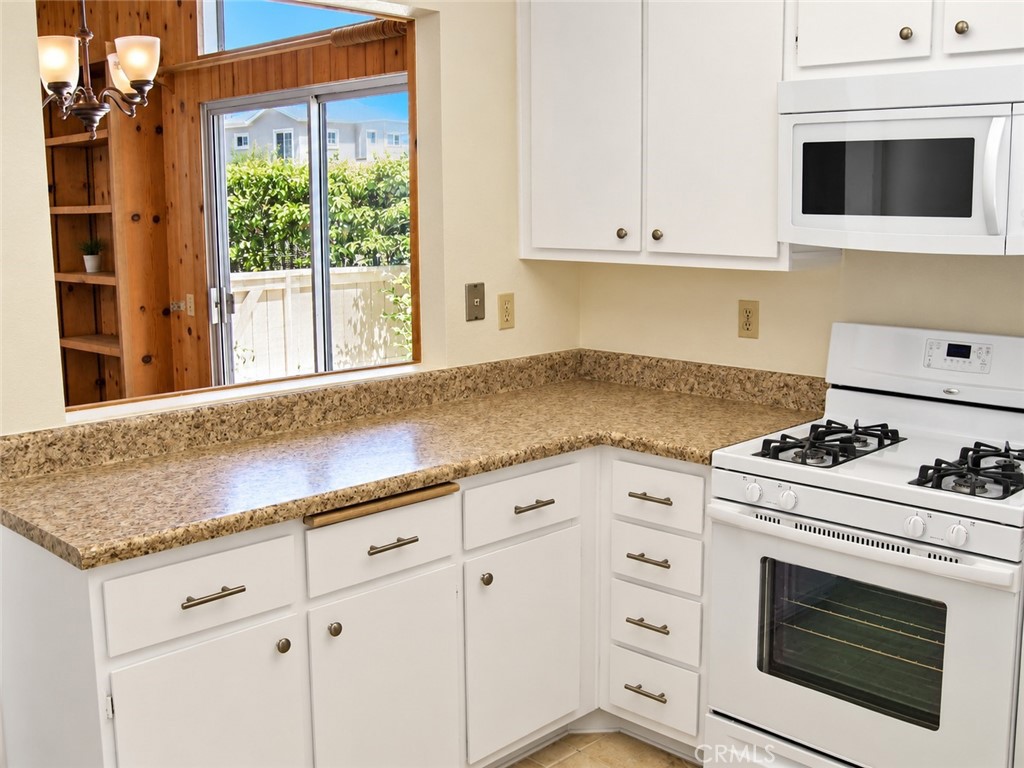 View of the kitchen towards the dining/living space - 12 Spring Buck, Irvine CA 92614 - photo 3