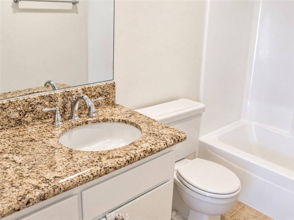 Secondary bath has shower/tub enclosure - 12 Spring Buck, Irvine CA 92614 - photo 7