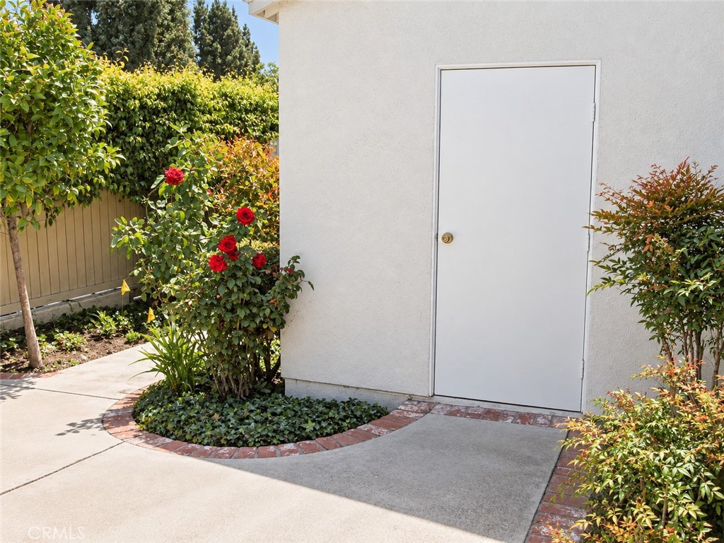 This door leads to the garage. It is attached to the house but no interior access - 12 Spring Buck, Irvine CA 92614 - photo 9