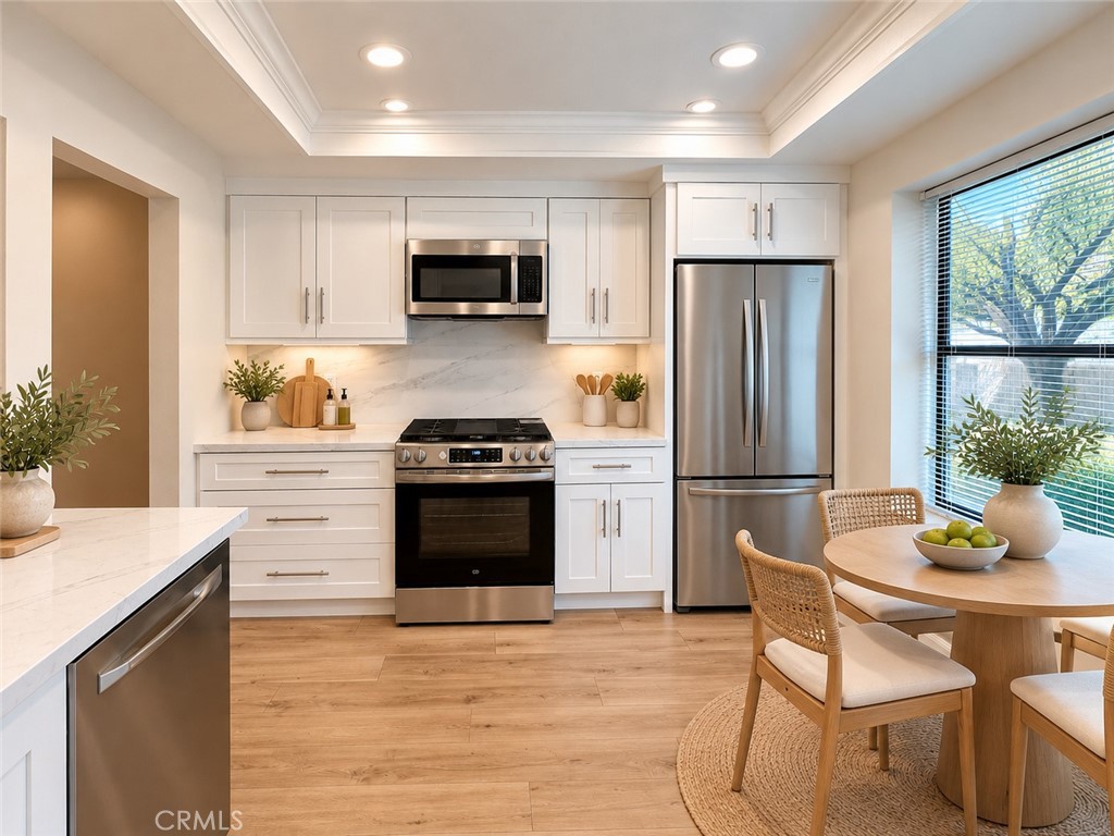 Virtually staged kitchen - 12 Springwater, Irvine CA 92604 - photo 2