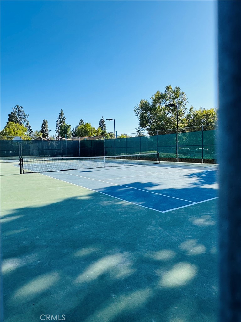 Multiple tennis courts, covered tot lot,assoc pool and spa. - 124 Tangelo Unit 390, Irvine CA 92618 - photo 6