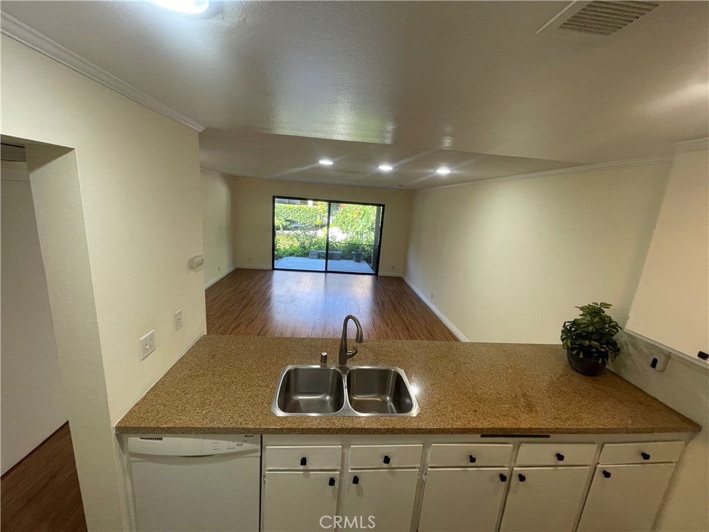 Kitchen water view, extra large breakfast nook - 124 Tangelo Unit 390, Irvine CA 92618 - photo 8