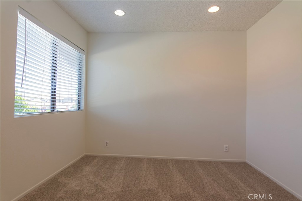 2nd bedroom with recessed lights - 125 Tarocco, Irvine CA 92618 - photo 20