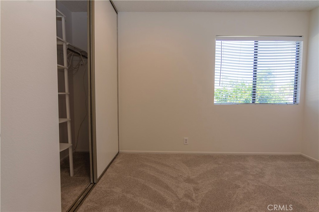 2nd bedroom closet - 125 Tarocco, Irvine CA 92618 - photo 21