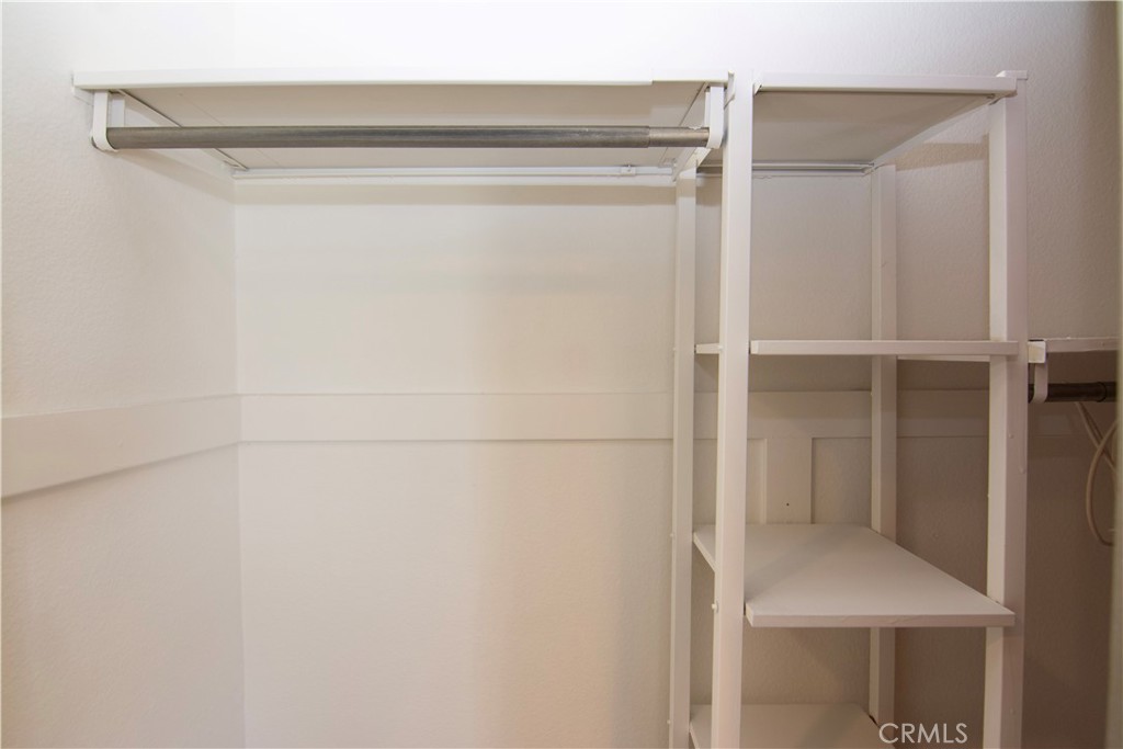 2nd bedroom closet organizers - 125 Tarocco, Irvine CA 92618 - photo 22