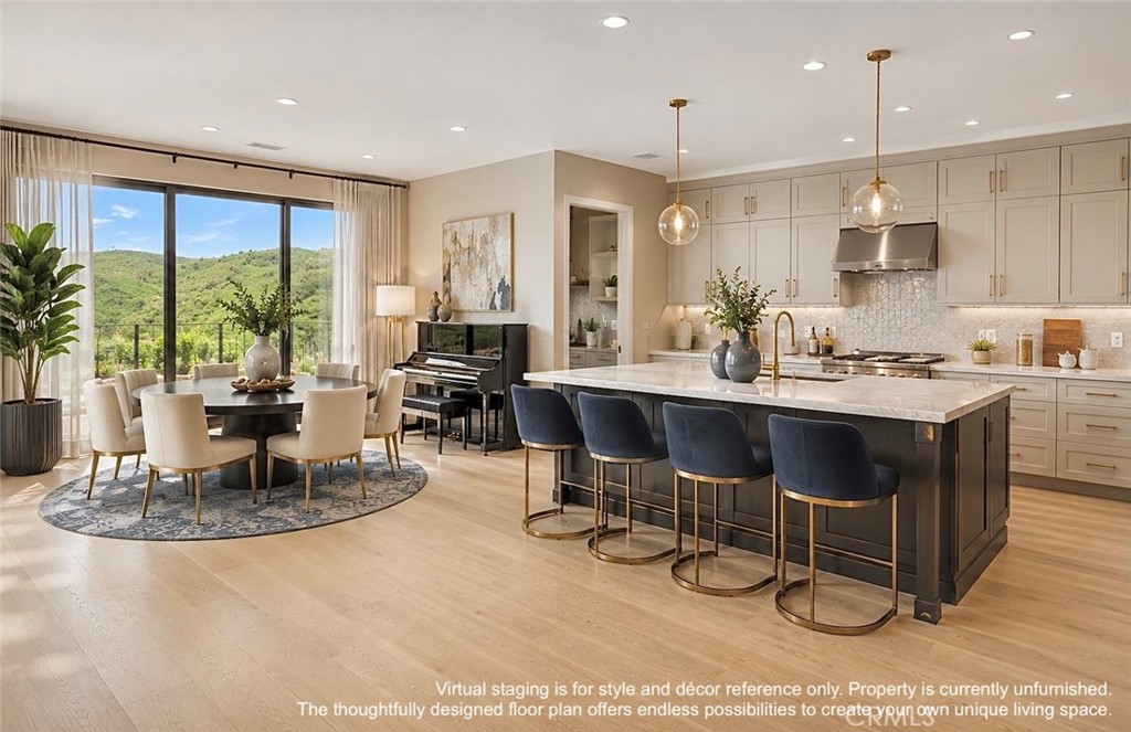 Virtual staging is for style and décor reference only. Property is currently unfurnished. The thoughtfully designed floo - 128 Roscomare, Irvine CA 92602 - photo 3