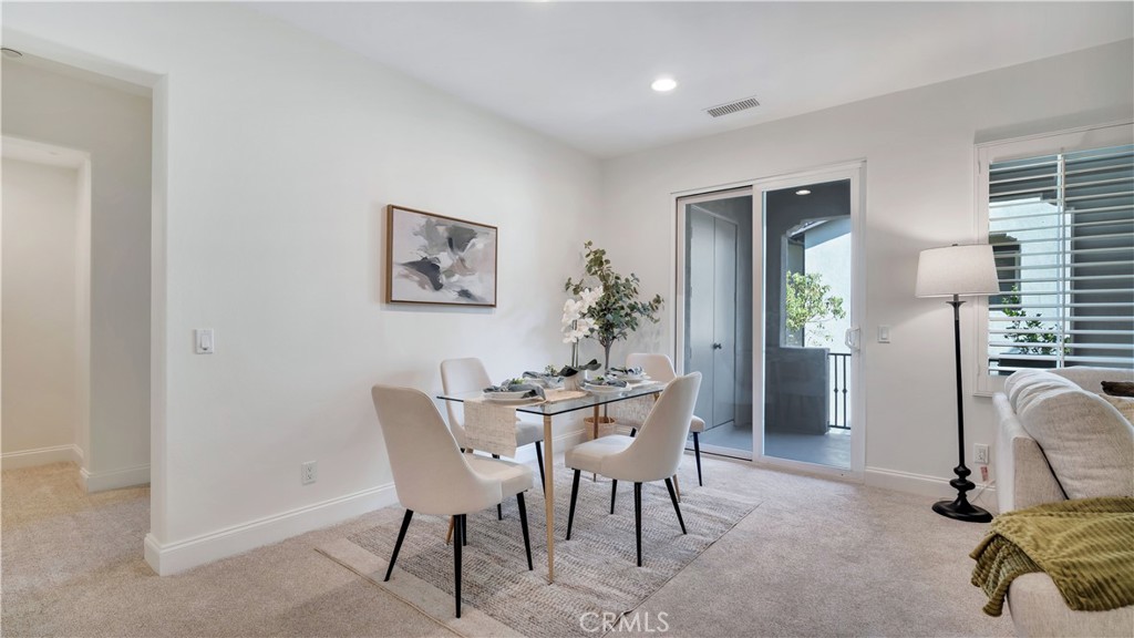 Dining area can accommodate a large table and room for all. - 128 Talmadge, Irvine CA 92602 - photo 6
