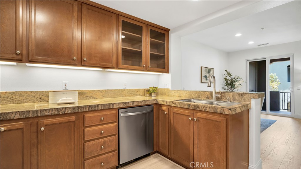 Beech cabinets and granite counters, stainless appliances. - 128 Talmadge, Irvine CA 92602 - photo 9