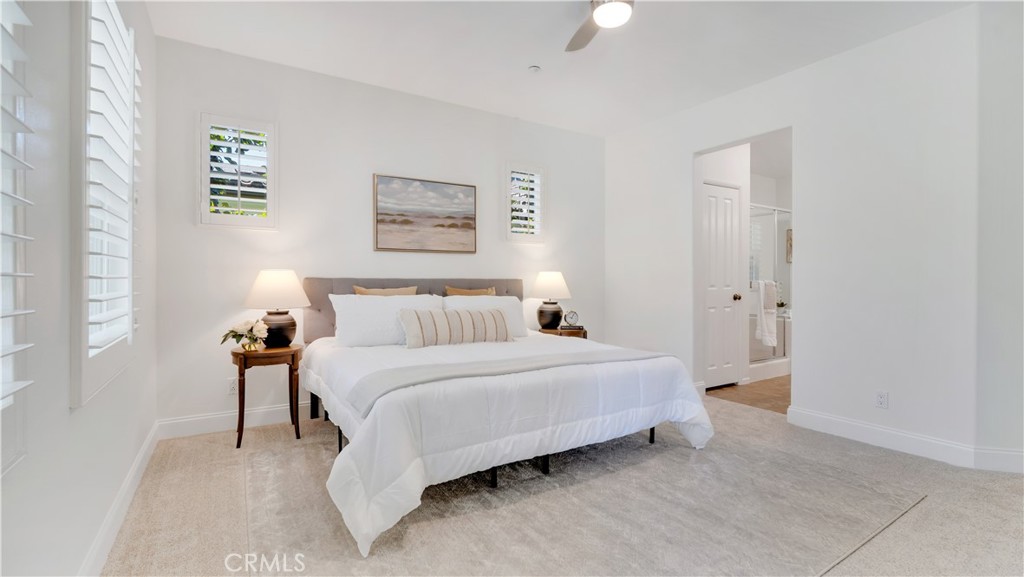 Oversized primary bedroom. Lush new carpet here. - 128 Talmadge, Irvine CA 92602 - photo 10