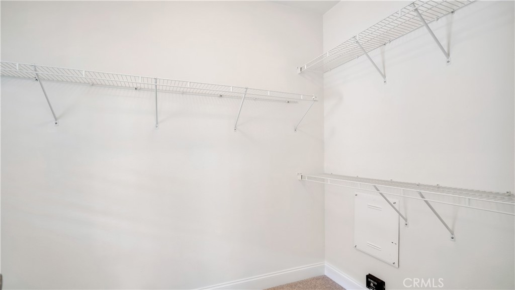 Walk-in closet - 128 Talmadge, Irvine CA 92602 - photo 25