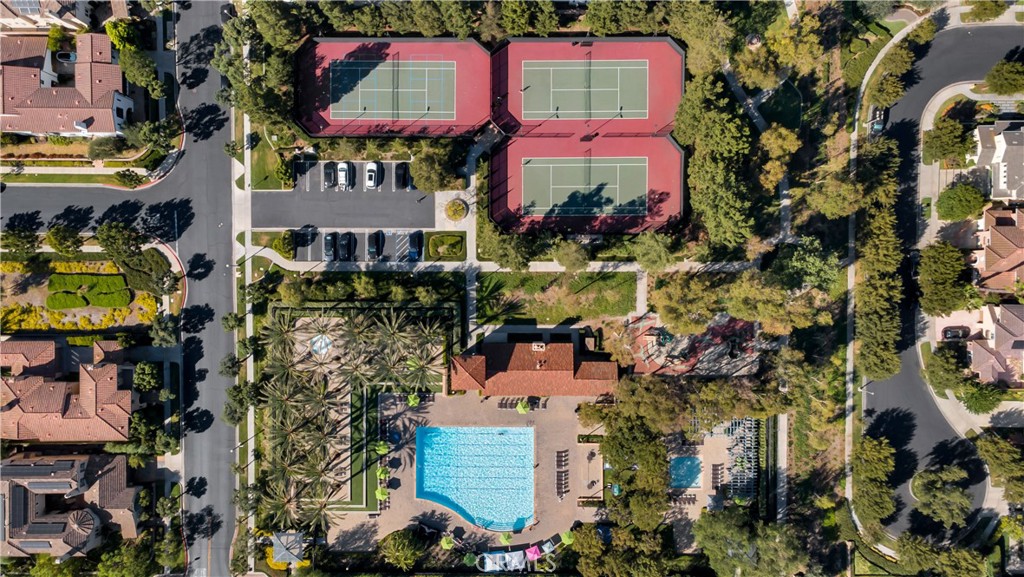 Another view of the Main pool and check out the tennis courts. - 128 Talmadge, Irvine CA 92602 - photo 28