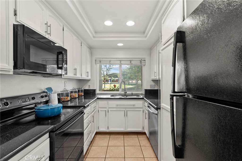 Kitchen includes refrigerator, microwave, stove, dishwasher - 13 Sunflower, Irvine CA 92604 - photo 8