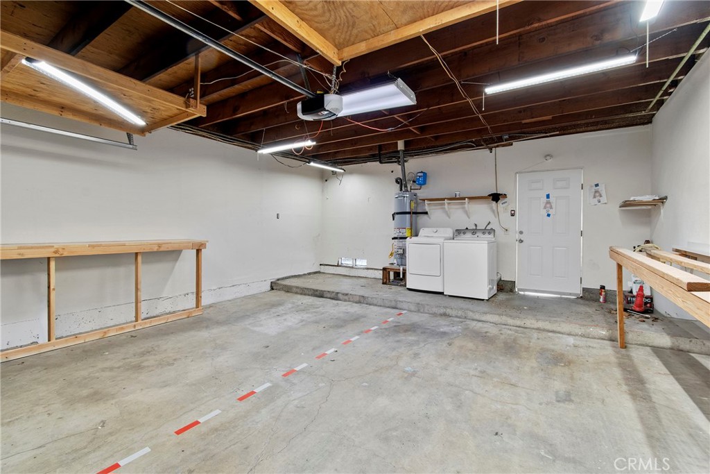 2 car garage parking includes washer/dryer and plenty of space for extra storage - 13 Sunflower, Irvine CA 92604 - photo 15
