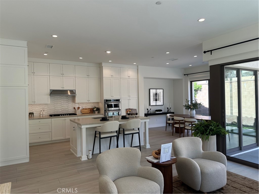 living room/ kitchen - 134 Spotted Quail, Irvine CA 92618 - photo 7