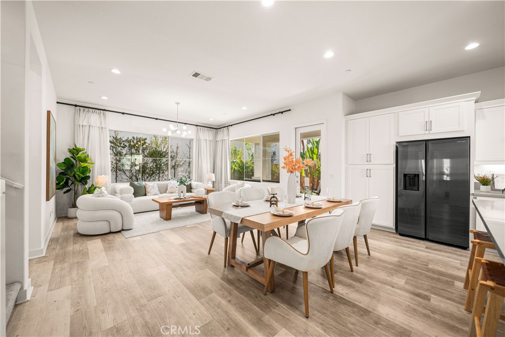 irst floor: Living, Dining, Kitchen & MAIN FLOOR BEDROOM WITH FULL BATH - 136 Episode, Irvine CA 92618 - photo 3
