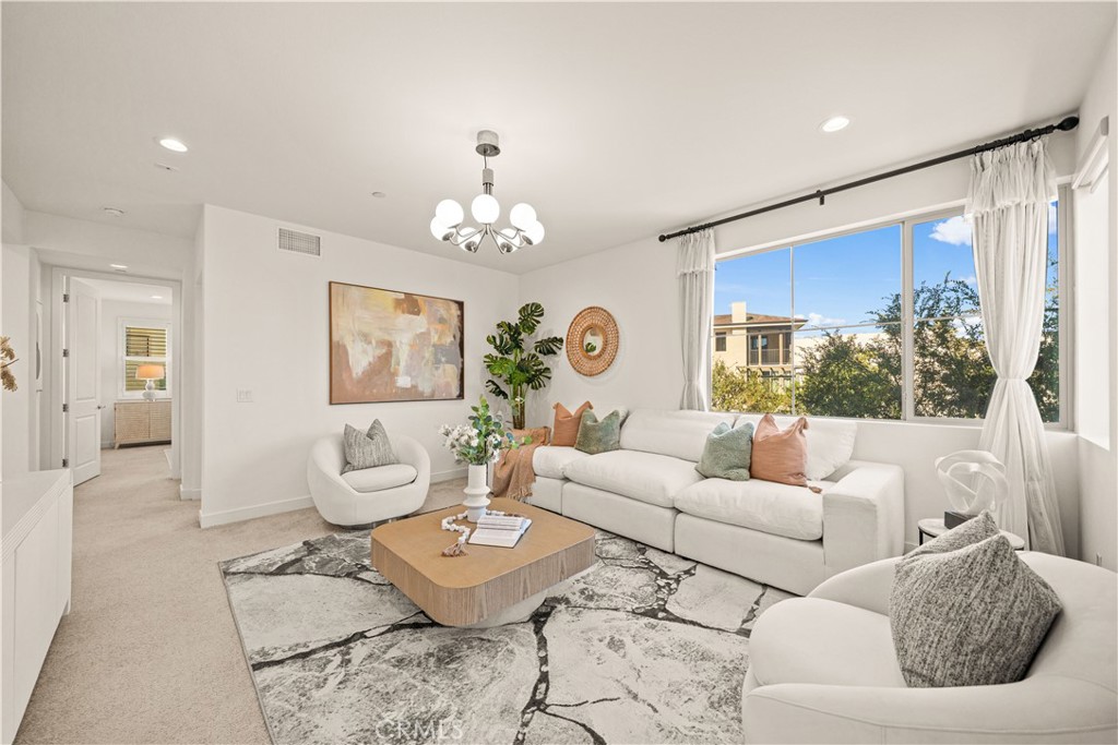 Second floor: GENEROUSLY SIZED LOFT, Primary suite, Two additional bedrooms - 136 Episode, Irvine CA 92618 - photo 30