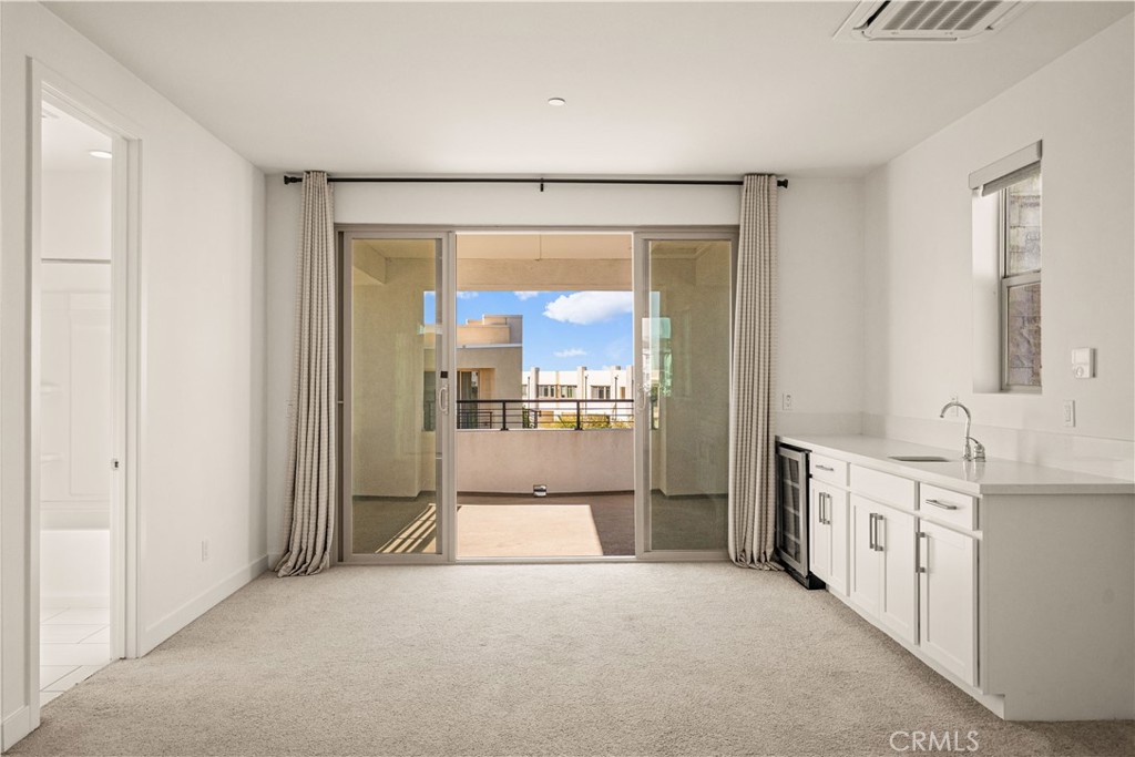 The third floor features a SPACIOUS BONUS ROOM WITH ITS OWN DOOR for added privacy, opening to A COVERED BALCONY WITH RE - 136 Episode, Irvine CA 92618 - photo 54