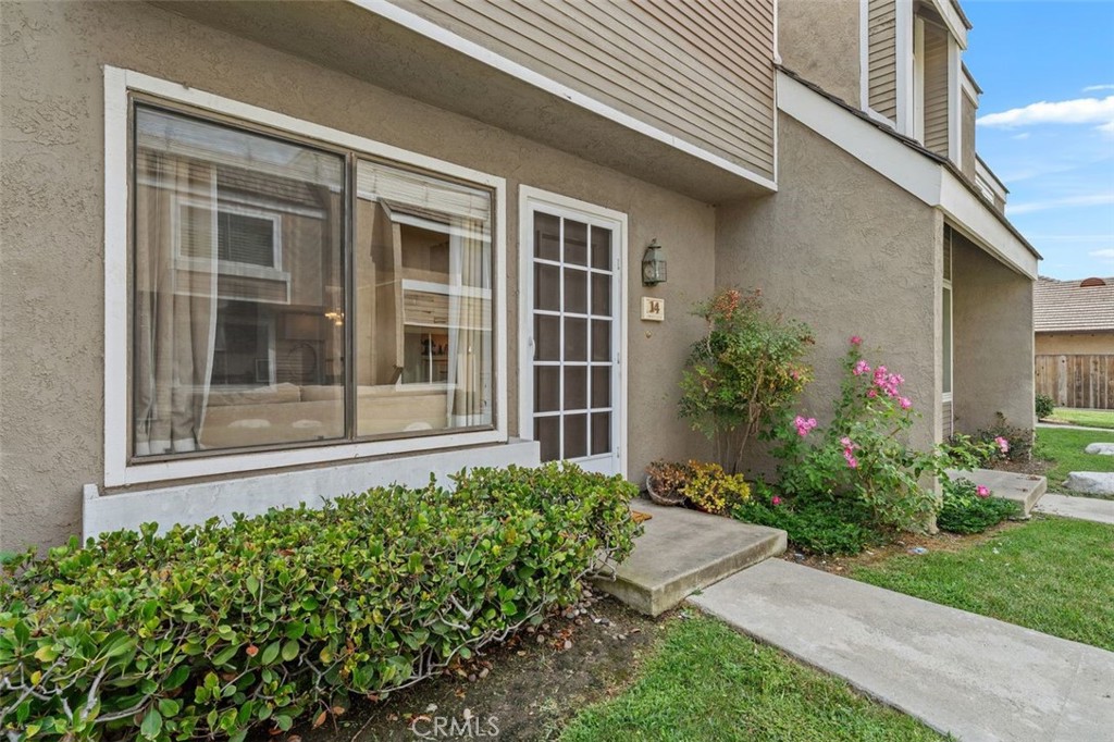 Front entry with landscaped walkway. - 14 Greenleaf, Irvine CA 92604 - photo 2