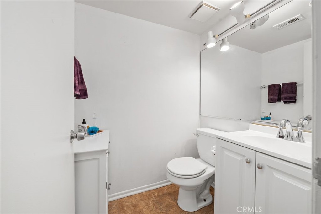 Convenient main-level powder room. - 14 Greenleaf, Irvine CA 92604 - photo 9