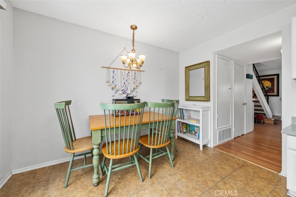 Dining area with direct access to the outdoor patio. - 14 Greenleaf, Irvine CA 92604 - photo 11