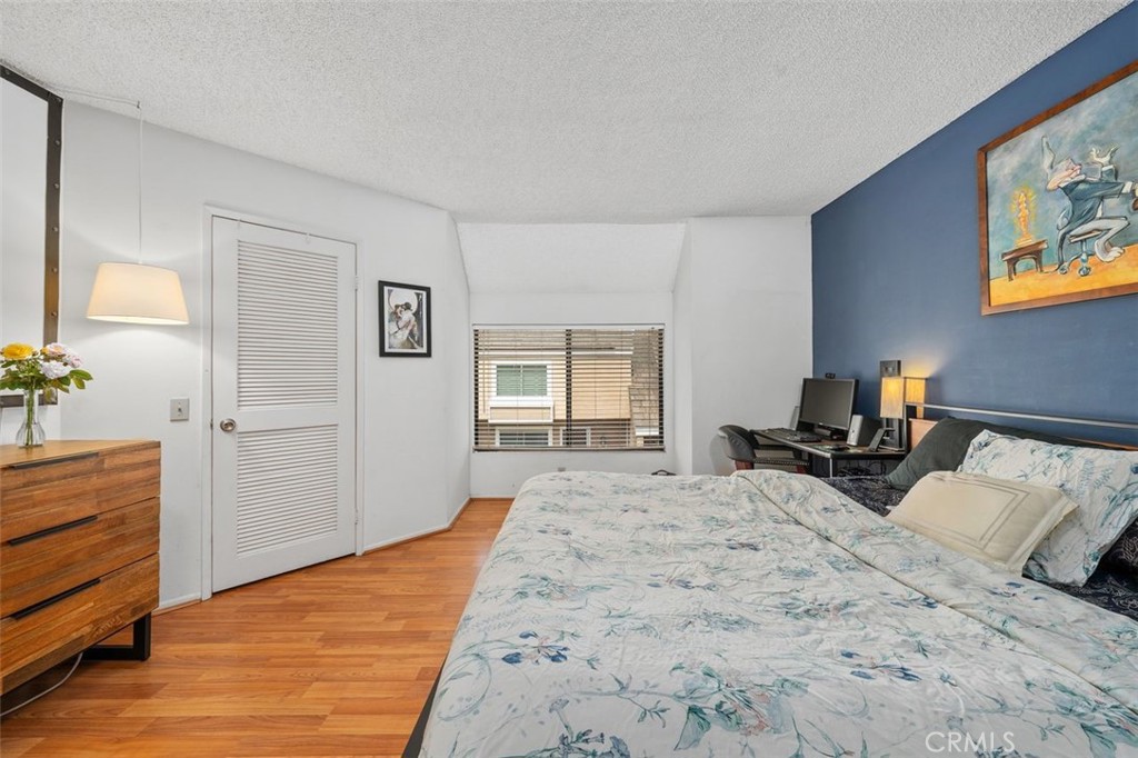 Primary bedroom offering flexible space for a desk or additional furnishings. - 14 Greenleaf, Irvine CA 92604 - photo 20