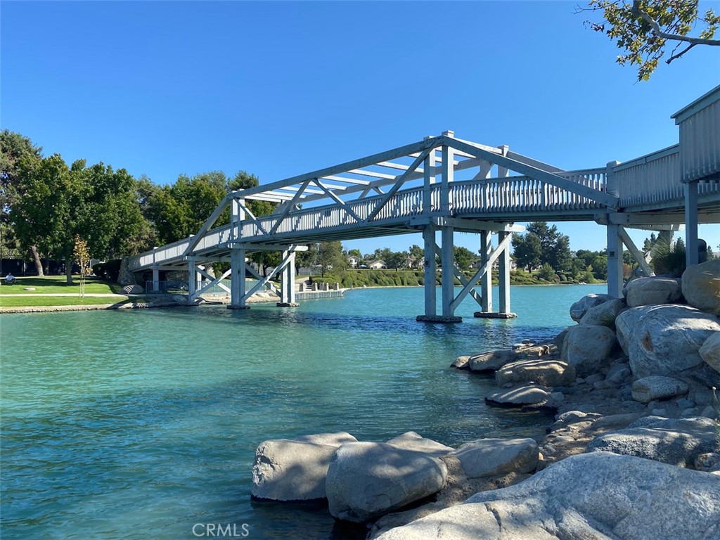 Iconic Woodbridge pedestrian bridge crossing the lake. - 14 Greenleaf, Irvine CA 92604 - photo 40