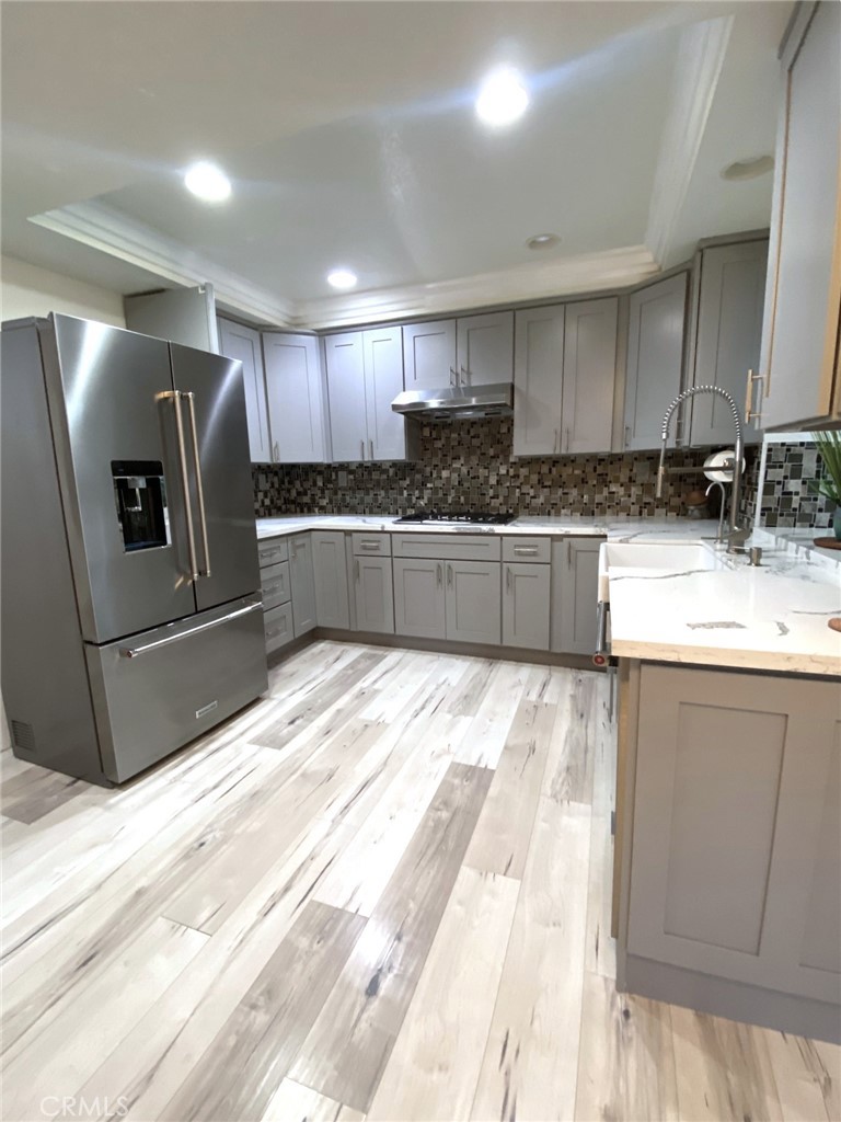 Gourmet kitchen with ample modern cabinets - 14 Rainbow Lk 3, Irvine CA 92614 - photo 6