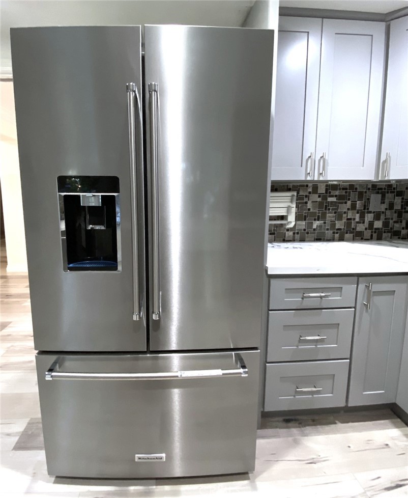 And large newer stainless-steel refrigerator - 14 Rainbow Lk 3, Irvine CA 92614 - photo 10