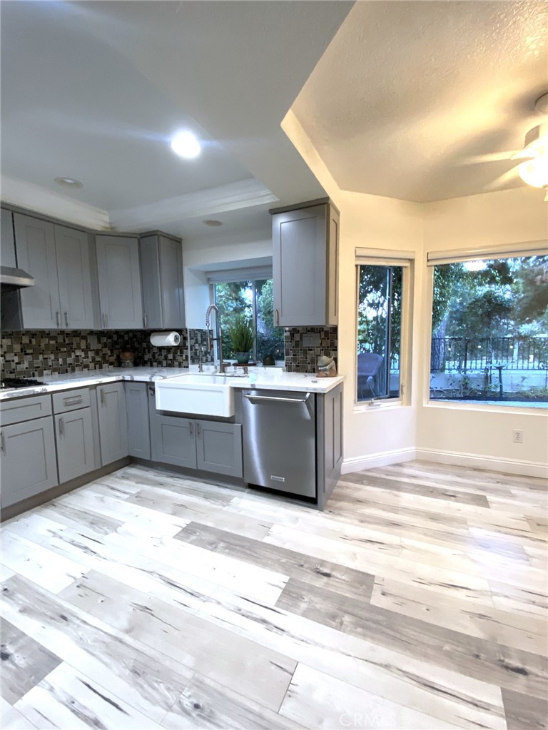 Breakfast nook, large windows in Kitchen overlooking the backyard - 14 Rainbow Lk 3, Irvine CA 92614 - photo 13
