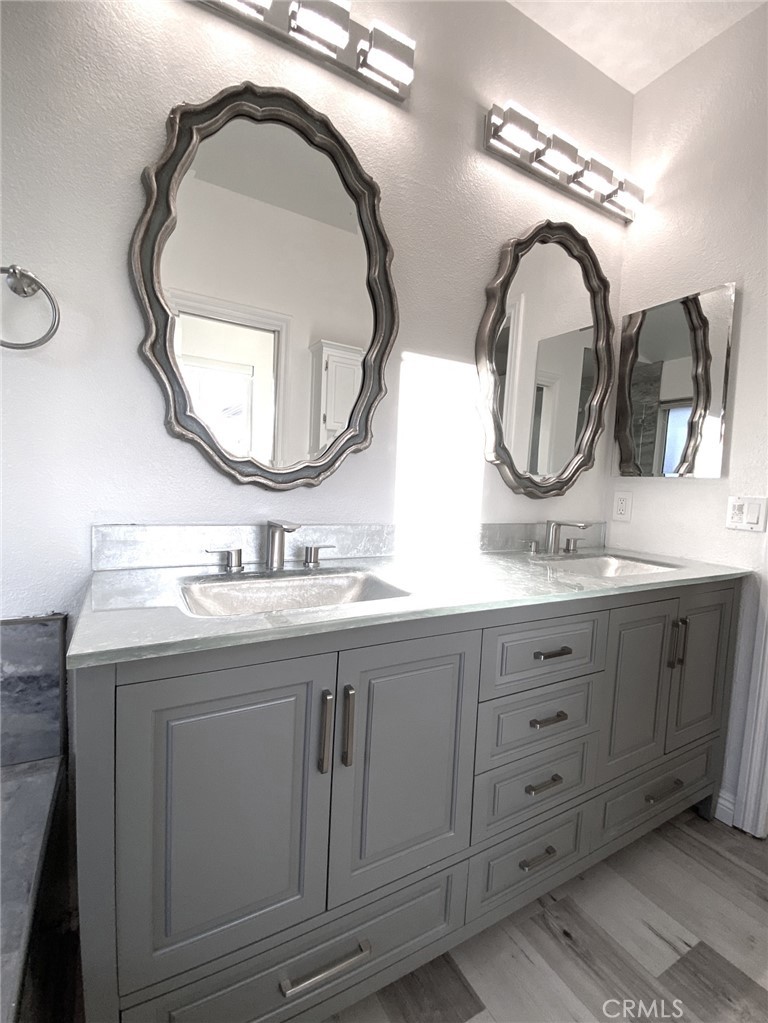 With beautiful glass-like easy to clean countertops - 14 Rainbow Lk 3, Irvine CA 92614 - photo 25
