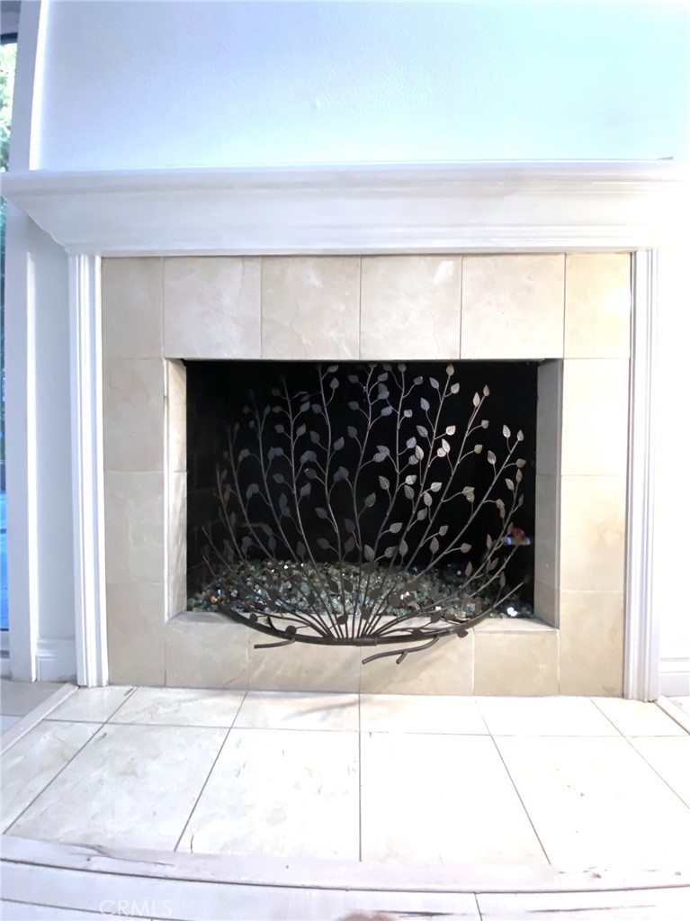 Gas fireplace in living room - 14 Rainbow Lk 3, Irvine CA 92614 - photo 34