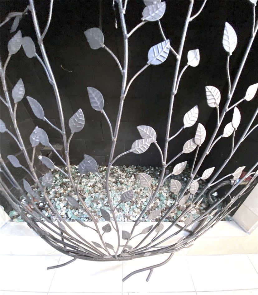 With elegant fireplace cover and contemporary glass beads - 14 Rainbow Lk 3, Irvine CA 92614 - photo 35