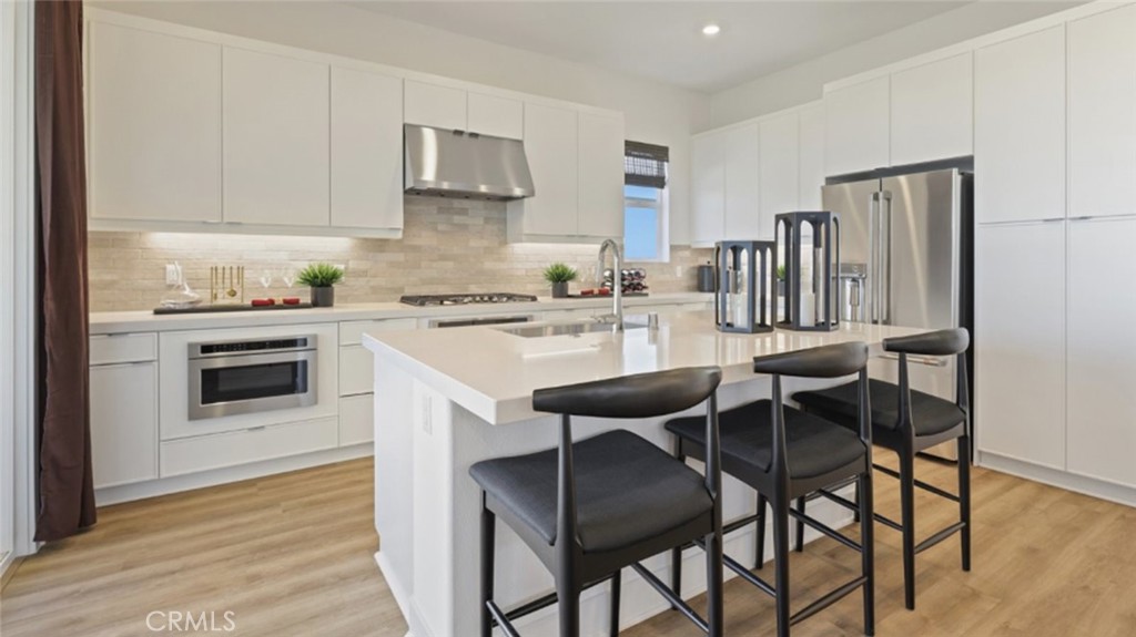 Photos shown are of model only- not actual homesite. - 140 Tiffin, Irvine CA 92618 - photo 1