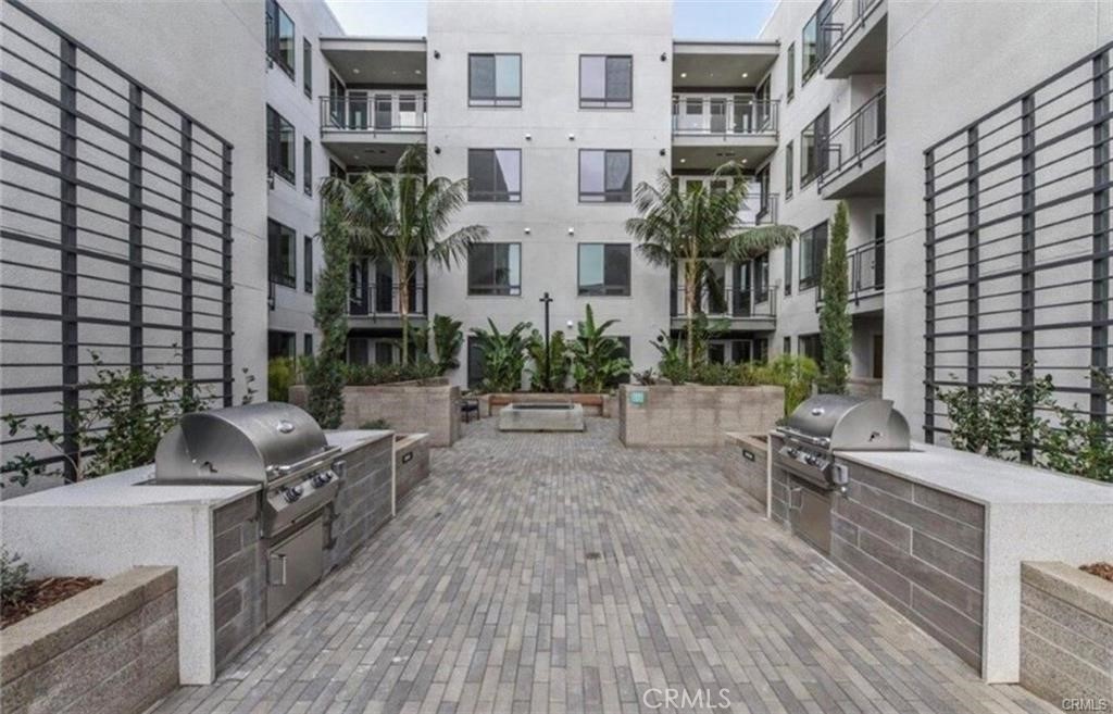 Community BBQ next to unit - 1418 Nolita, Irvine CA 92612 - photo 27