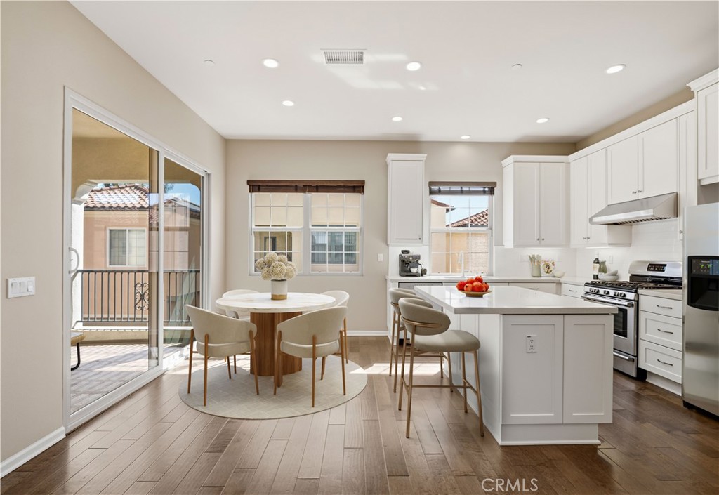 Dining/Kitchen Area - Virtually Staged - 142 Firefly, Irvine CA 92618 - photo 7