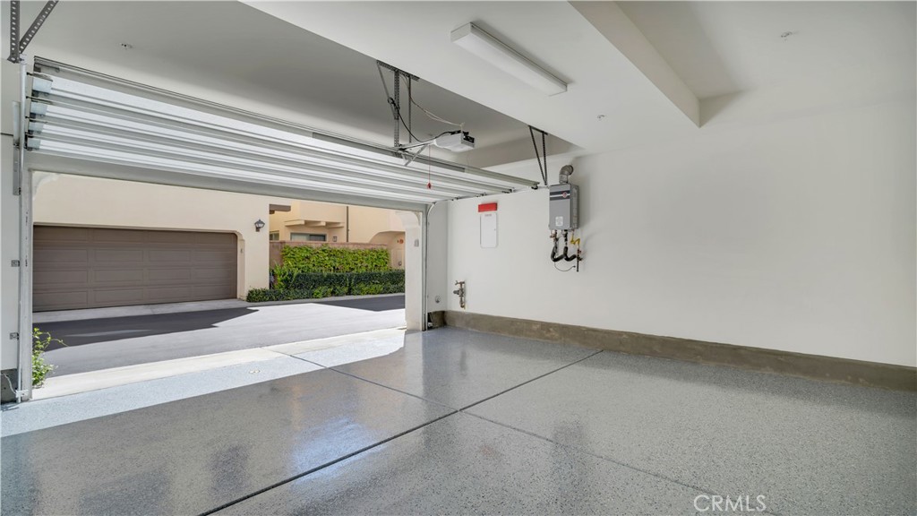 Garage with epoxy flooring - 142 Firefly, Irvine CA 92618 - photo 36