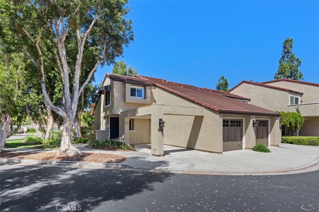 Side View -lovely corner lot - 142 Stanford Court 71, Irvine CA 92612 - photo 3
