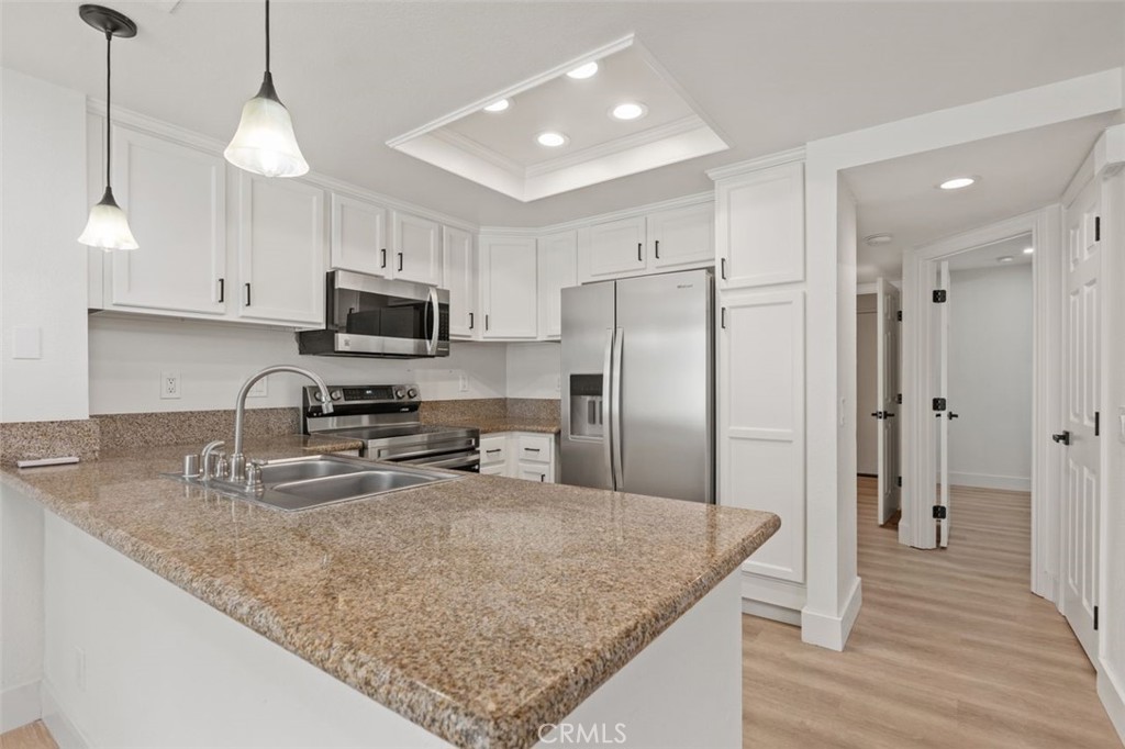 Kitchen - 142 Stanford Court 71, Irvine CA 92612 - photo 11
