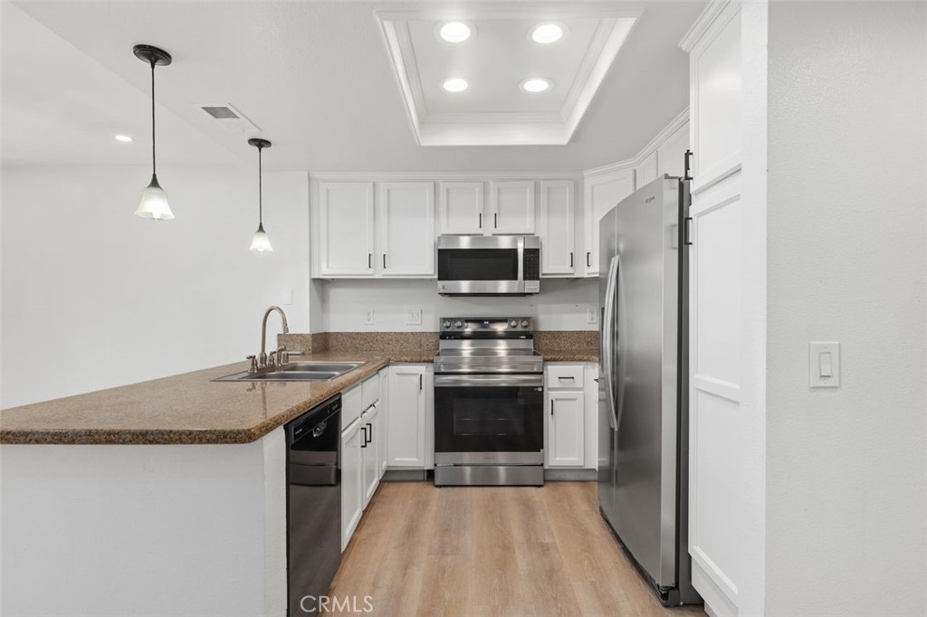 Kitchen - 142 Stanford Court 71, Irvine CA 92612 - photo 12